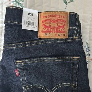 Levi's Blue Relaxed Jeans with Iconic Red Tab and Leather Patch